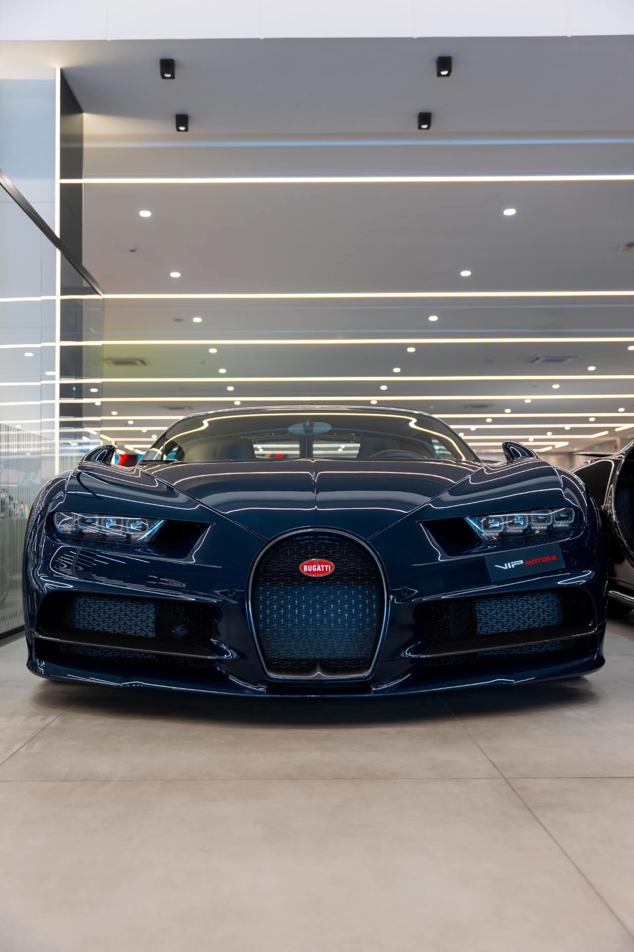 Dark blue Bugatti Chiron front view at VIP Motors