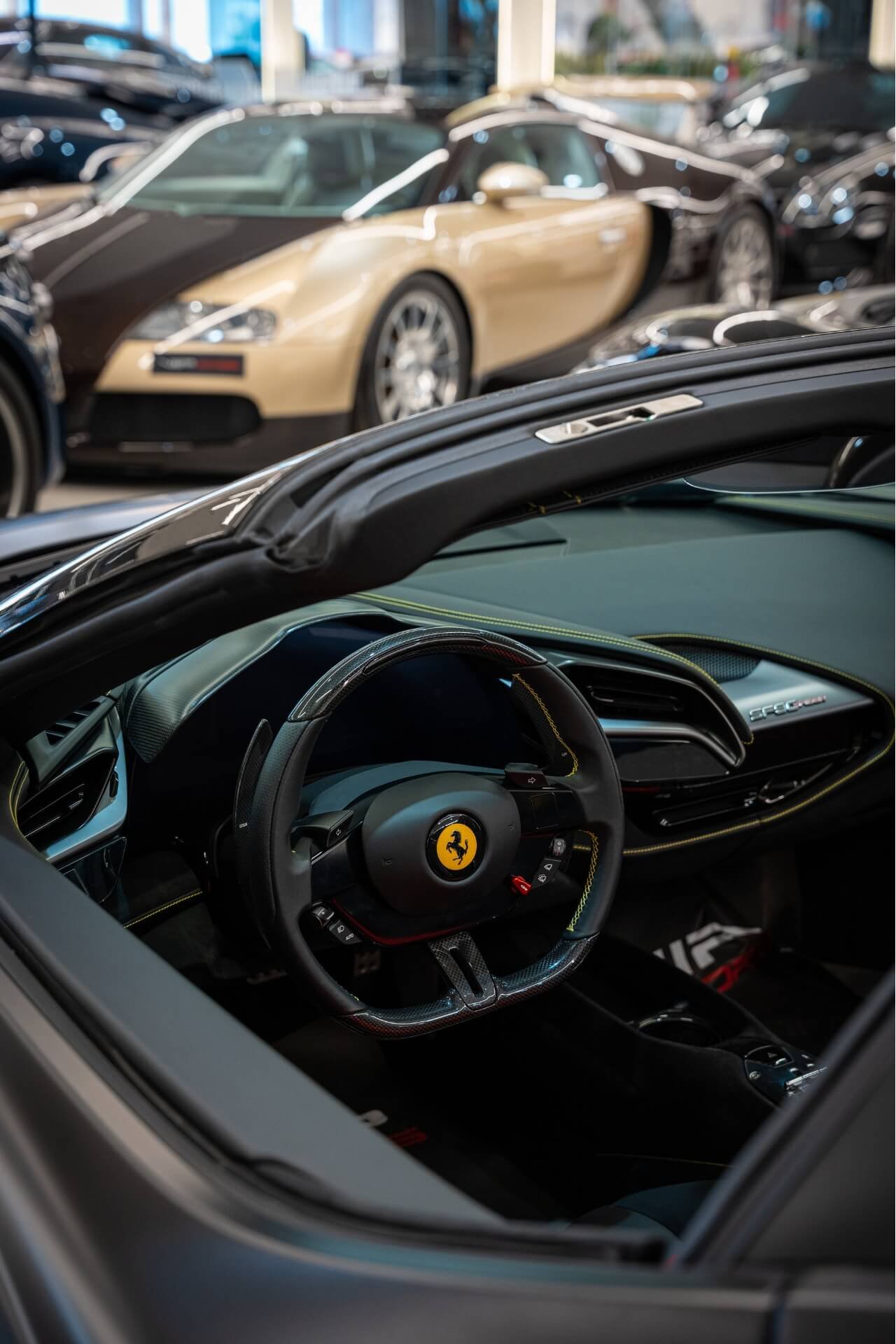 Black interior of a red Ferrari cabrio