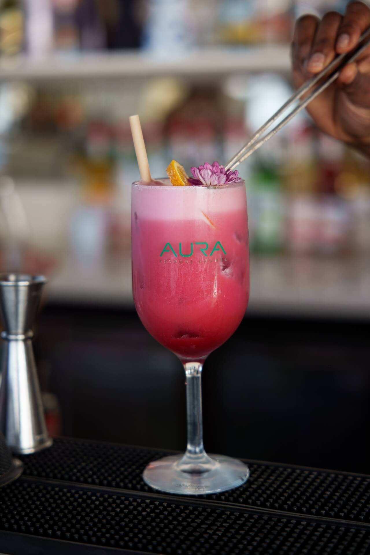 Pink cocktail at Aura Skypool