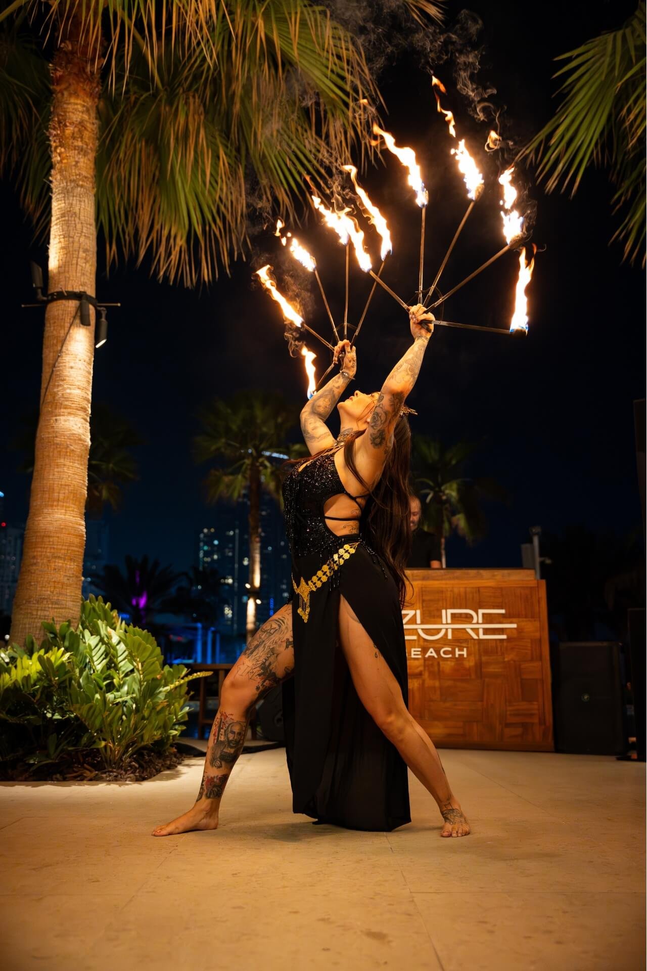 Girl as fire performer at event Azure Beach