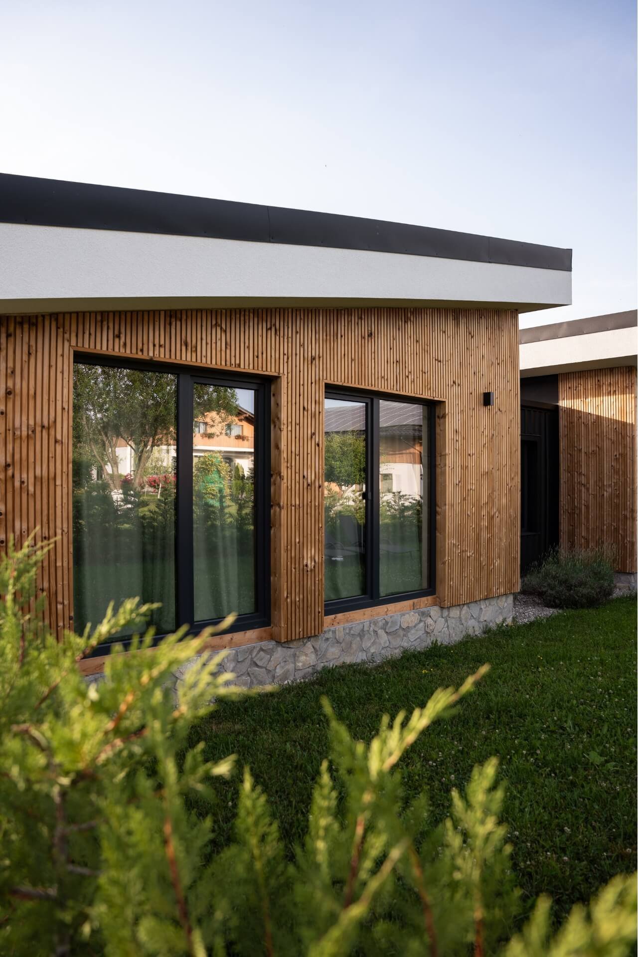 Villa front view at Green Resort Bran with greenery