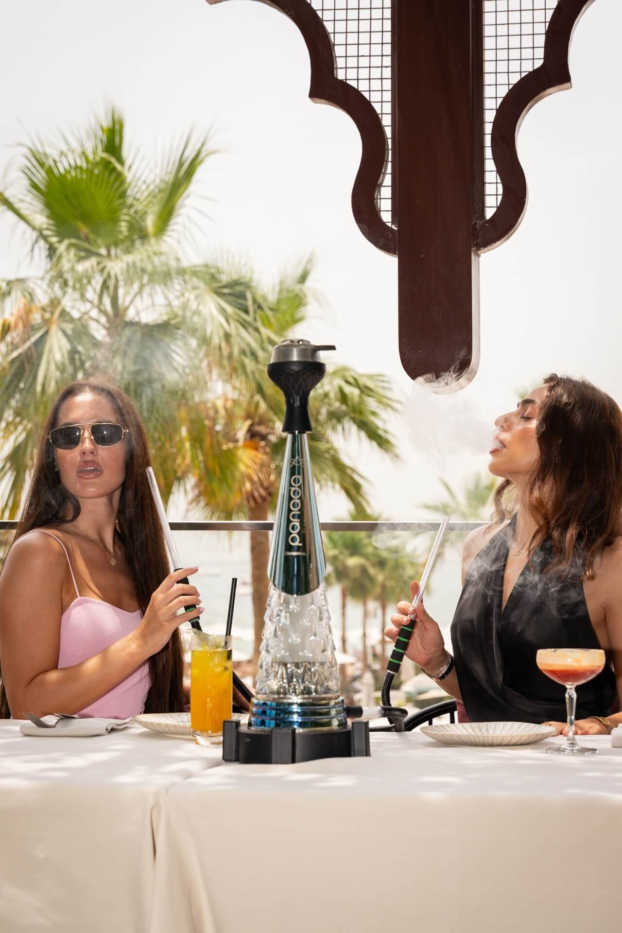 Girls smoking shisha at Asil restaurant