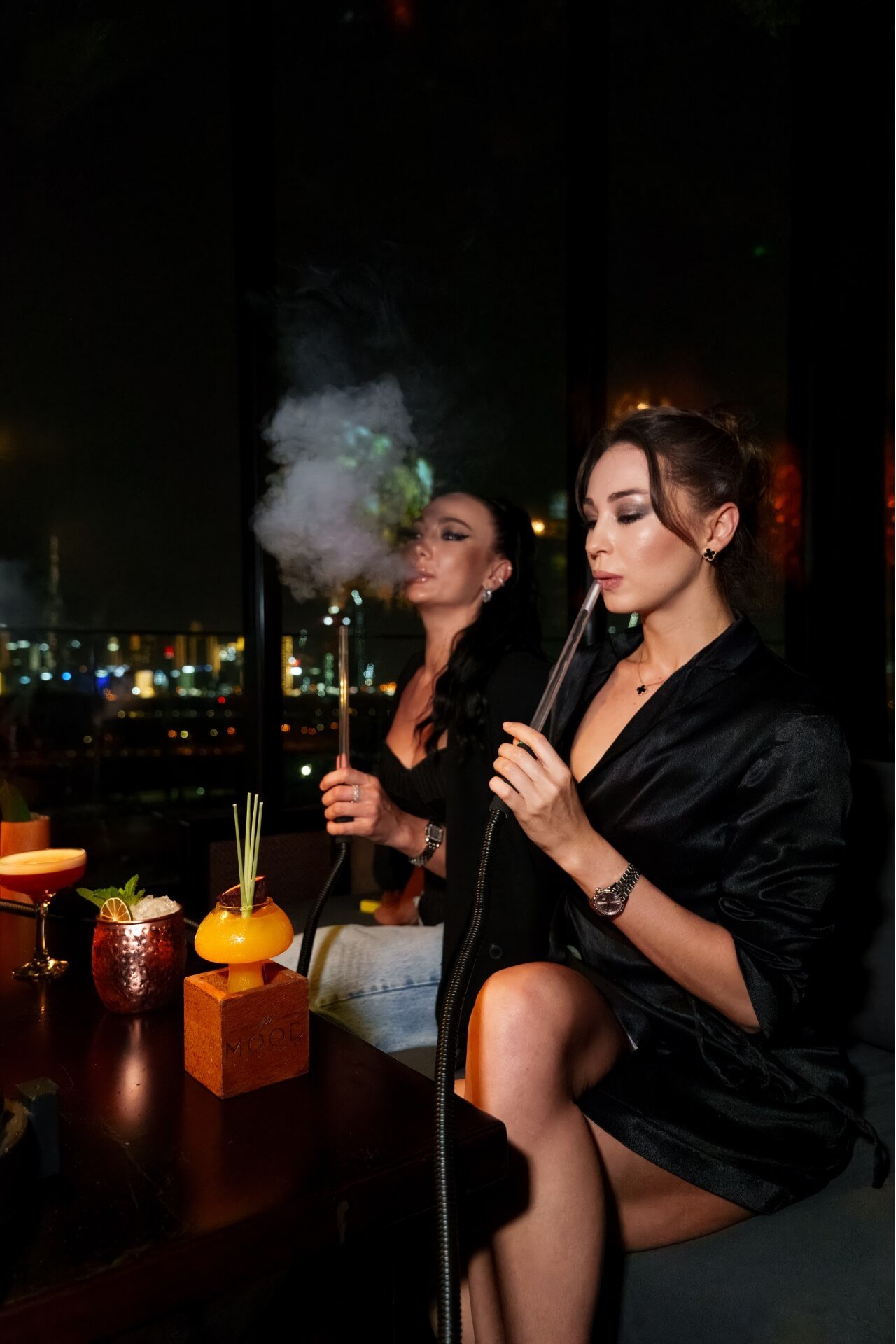 Girls enjoying cocktails and shisha at Mood Rooftop Dubai
