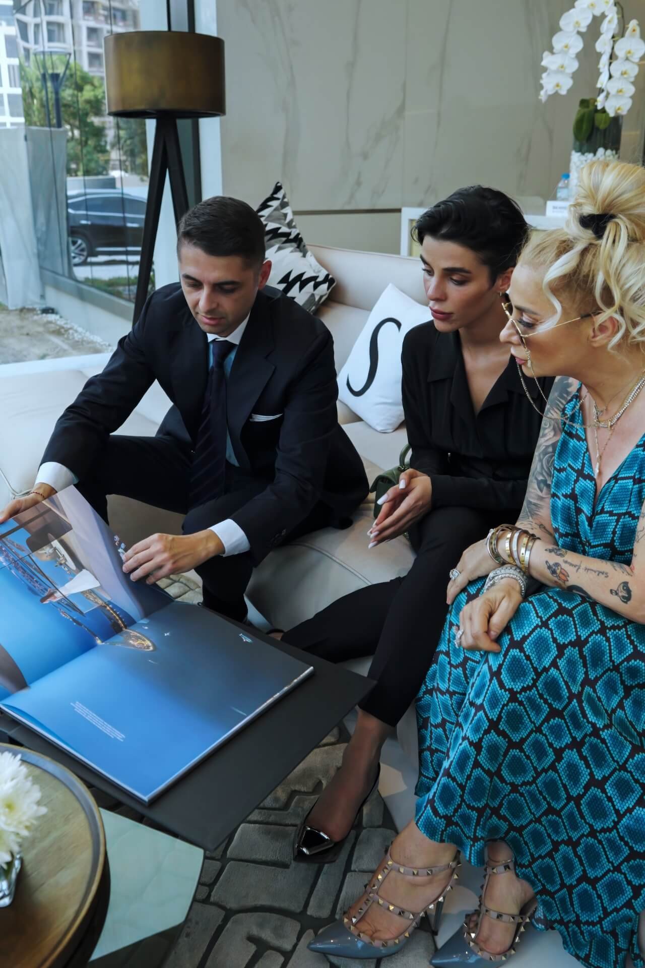 Photo inside Sobha Realty showroom with real estate agents