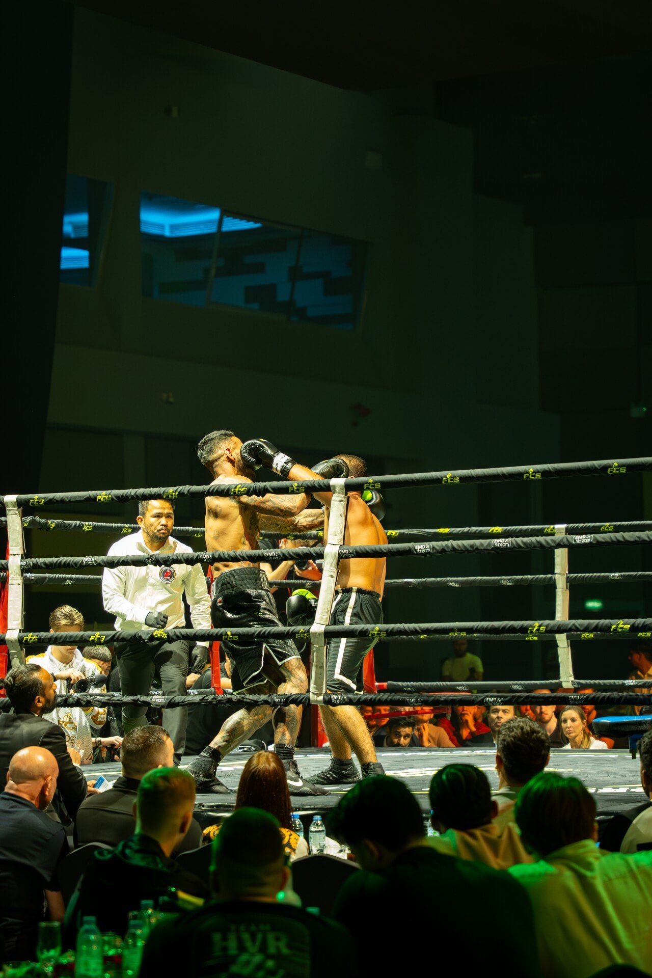 Boxing athletes throwing punches to each other during Fightgecko competition in Dubai